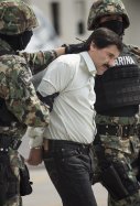 EuropaPress 1910277 February 22 2014    Mexico City D F  Mexico Joaquin 'el Chapo' Guzman is escorted to a helicopter in handcuffs by Mexican navy marines at a navy hanger Guzman leader of Mexico's Sinaloa drug Car