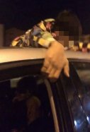 Coche Málaga menor en el techo  Policia Local de Málaga