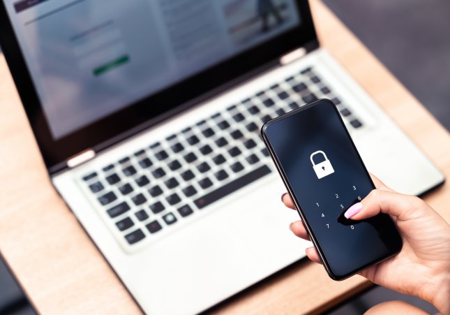 EuropaPress 4740305 april 2022 phone password lock for mobile cyber security or login