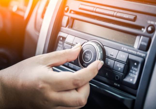radio cotxe volum musica