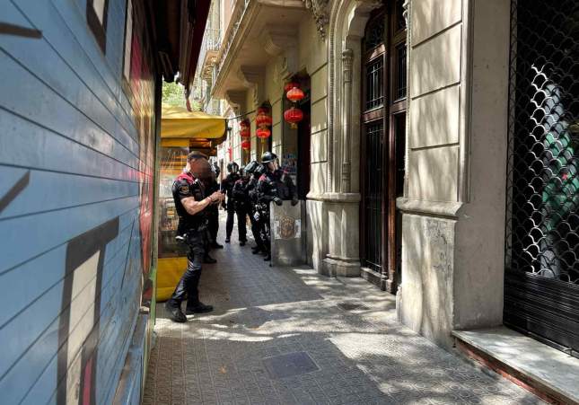 carrer diputacio mossos pixelada